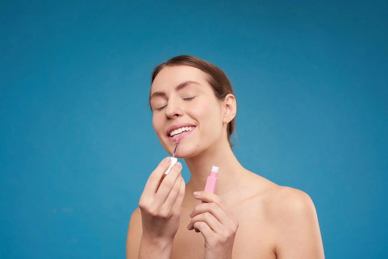 Photo by Shiny Diamond: https://www.pexels.com/photo/woman-applying-lipstick-3373727/